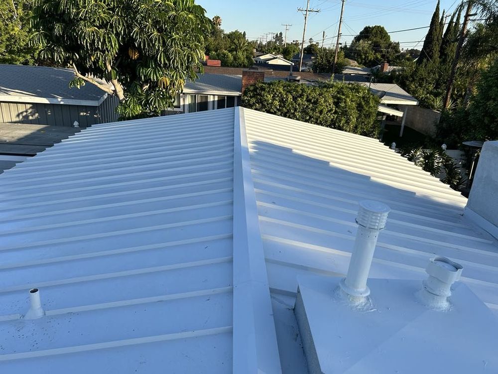 Slide of New Village Roofing