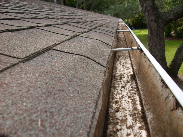 Slide of Tropical Roof & Exterior Cleaning Systems