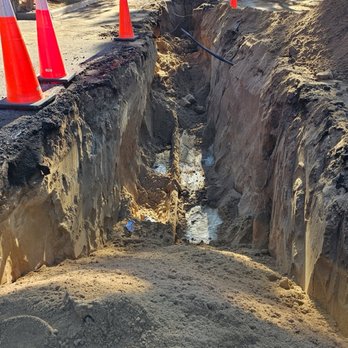 Garvin's Plumbing and Sewer - Pictures of a 60 foot dig for the Watermain excavation - Plumbing Near Me - Englewood, Colorado Garvin's Plumbing and Sewer - Pictures of a 60 foot dig for the Watermain excavation - Plumbing Near Me - Englewood, Colorado