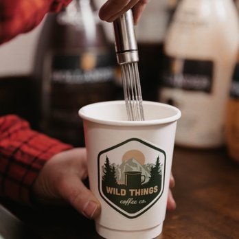 Wild Things Coffee - a person mixing a cup of coffee - Coffee & Tea Near Me - Meridian, Idaho Wild Things Coffee - a person mixing a cup of coffee - Coffee & Tea Near Me - Meridian, Idaho