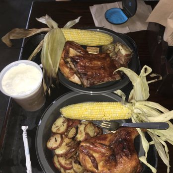 Three Broomsticks - Roasted chicken and roasted chicken and ribs dish, both come with potatoes and corn. - British Near Me - Orlando, Florida Three Broomsticks - Roasted chicken and roasted chicken and ribs dish, both come with potatoes and corn. - British Near Me - Orlando, Florida