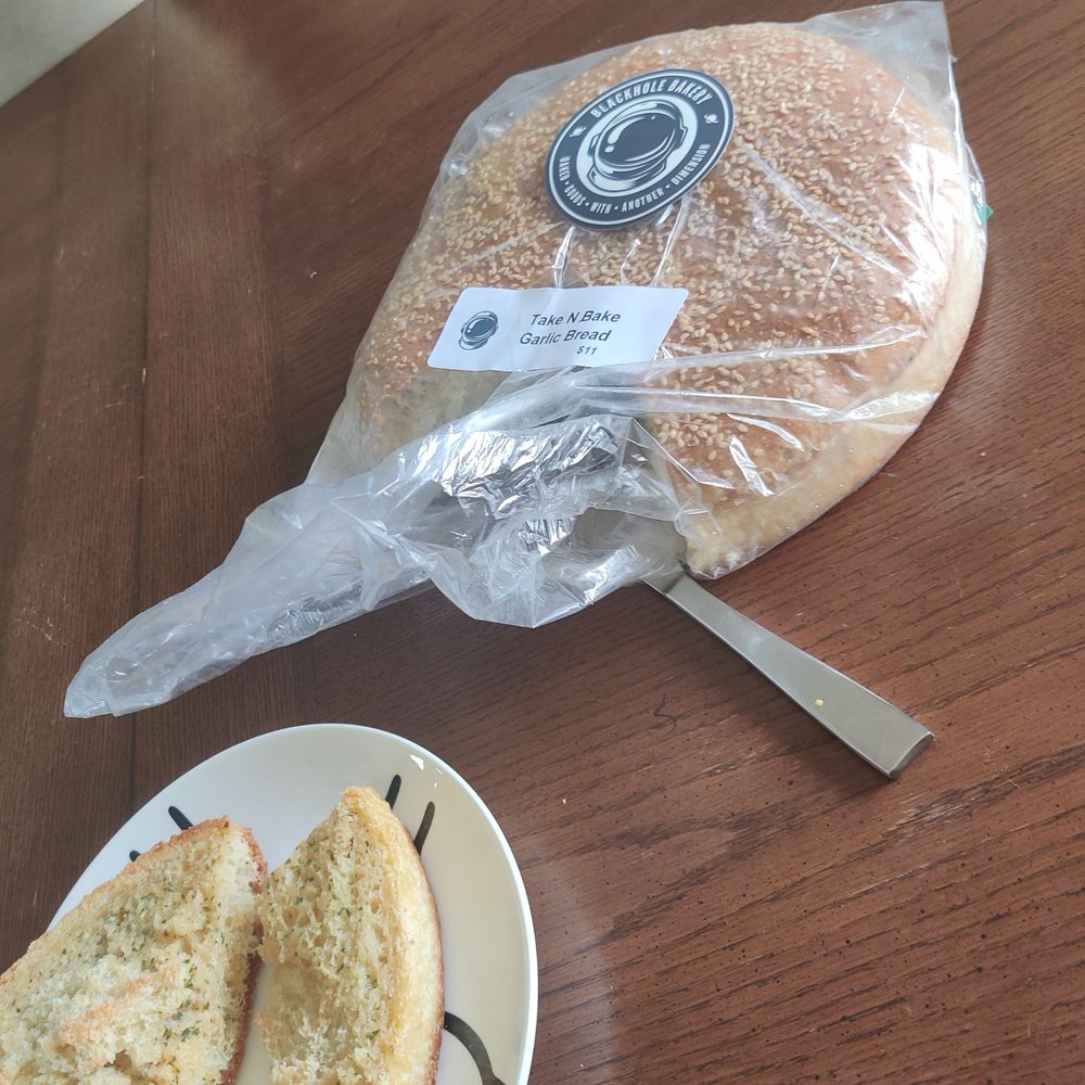 Blackhole Bakery - Take n bake garlic bread ($11). - Bakeries Near Me - Kansas City, Missouri