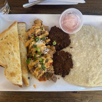 Mo' Brunch & Brews - Breakfast platter with toast, truffle hash, sausage, and grits - Breakfast & Brunch Near Me - Houston, Texas Mo' Brunch & Brews - Breakfast platter with toast, truffle hash, sausage, and grits - Breakfast & Brunch Near Me - Houston, Texas