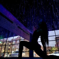 Black Swan Yoga - Practicing in the space at night