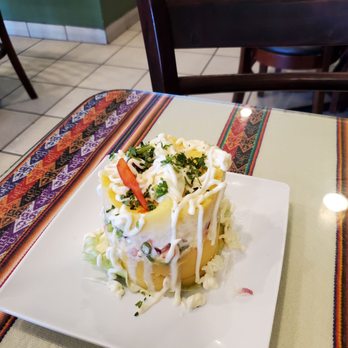 Mucho Gusto - It's a mashed potato tower... Me'h.  Overpriced and bland. - Peruvian Near Me - Fontana, California