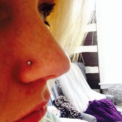 Baltimore Street Tattoo - Piercing done by Mike 50$ unless they have a 2 for 1 deal and you split it with your friends!