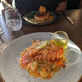 Rusty Pelican - Front in the Lobster and Shrimp Risotto Back is the Blackened Swordfish - Seafood Near Me - Tampa, Florida Rusty Pelican - Front in the Lobster and Shrimp Risotto Back is the Blackened Swordfish - Seafood Near Me - Tampa, Florida