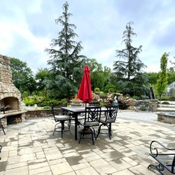 Rolling Meadows Landscape & Garden Center - Nice Area Behind the Store with a Fireplace and a Waterfall