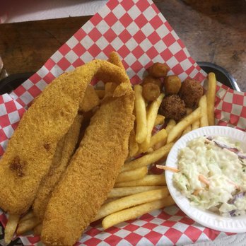 Sam's Southern Eatery - Giant slabs of succulent catfish, french fries, fried okra (side), and coleslaw. - Southern Near Me - Port Allen, Louisiana Sam's Southern Eatery - Giant slabs of succulent catfish, french fries, fried okra (side), and coleslaw. - Southern Near Me - Port Allen, Louisiana