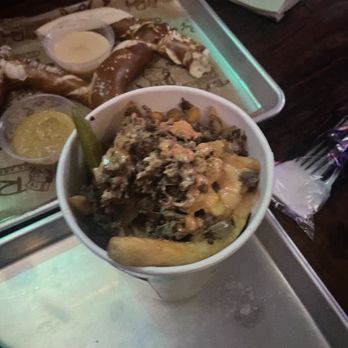 Tin Roof - Cheesesteak fries and pretzel - Music Venues Near Me - Chicago, Illinois Tin Roof - Cheesesteak fries and pretzel - Music Venues Near Me - Chicago, Illinois