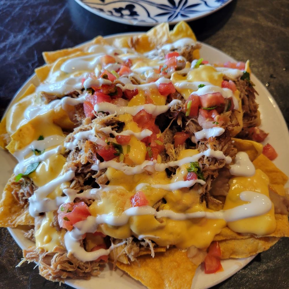 Roasted Chiles - Carnitas nachos. Buggah was mean - Mexican Near Me - Kihei, Hawaii Roasted Chiles - Carnitas nachos. Buggah was mean - Mexican Near Me - Kihei, Hawaii