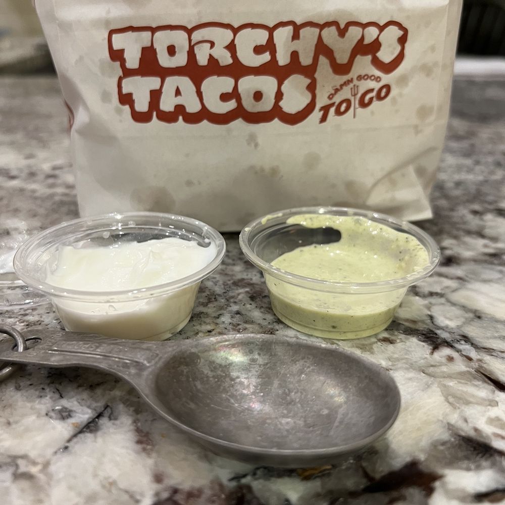 Torchy's Tacos - Small to go packaging for sauces that you pay a lot for - Tacos Near Me - Rogers, Arkansas Torchy's Tacos - Small to go packaging for sauces that you pay a lot for - Tacos Near Me - Rogers, Arkansas
