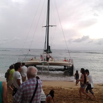 Maita'i Catamaran - Not going to let a little clouds and rain bring us down.  :) - Boating Near Me - Honolulu, Hawaii