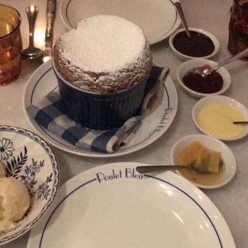 Poulet Bleu - Chocolate soufflé with caramelized banana ice cream. - French Near Me - Pittsburgh, Pennsylvania
