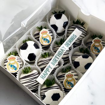 Fruitique - a box of cupcakes decorated with soccer balls - Chocolatiers & Shops Near Me Fruitique - a box of cupcakes decorated with soccer balls - Chocolatiers & Shops Near Me