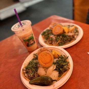 Tacos Los Tres Reyes - two plates of food on a table - Mexican Near Me - San Jose, California Tacos Los Tres Reyes - two plates of food on a table - Mexican Near Me - San Jose, California