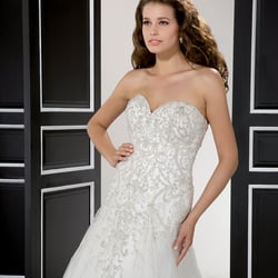 Paradise Fabrics & Costumes - Photo from the designer's website to show intricate hand beading detail.