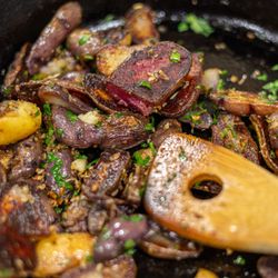 Crispy Garlic-Rosemary Fingerling Potatoes pan-fried in liquid gold (aka bacon fat)