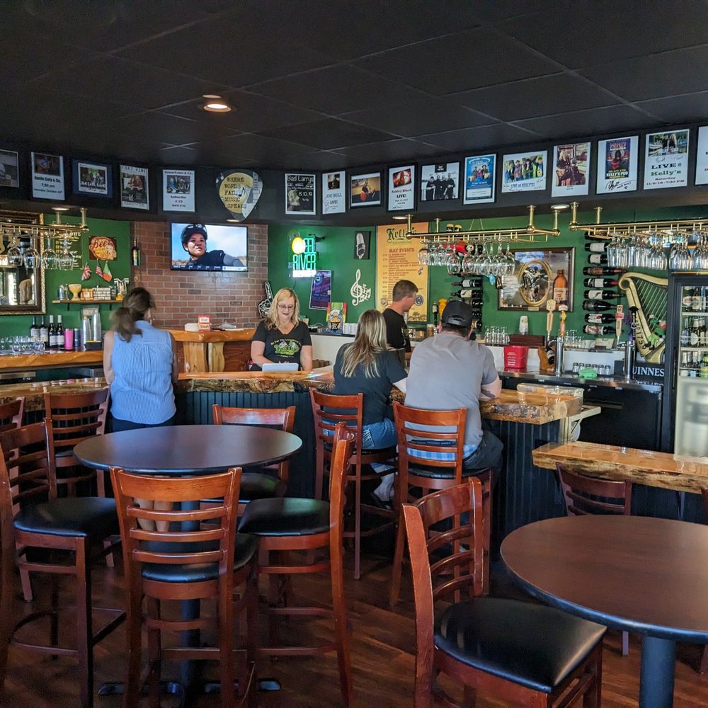 customers sitting at the bar customers sitting at the bar