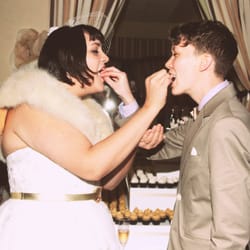 Cupcakes To Die For - April and Jenny enjoying a cupcake on their wedding day!