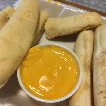 Mikes Pizza & Sub - a hot dog with mustard - Pizza Near Me - Sturgis, Michigan