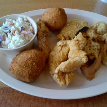 Seafood Café - a plate of fried food and a bowl of coleslaw - Seafood Near Me - Houston, Texas Seafood Café - a plate of fried food and a bowl of coleslaw - Seafood Near Me - Houston, Texas