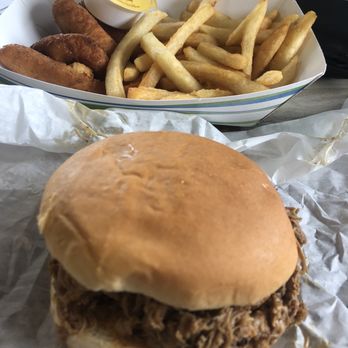 Pigman's Barbeque - BBQ Pulled pork boat! Comes with fries and hush puppies. - Sandwiches Near Me - Kill Devil Hills, North Carolina Pigman's Barbeque - BBQ Pulled pork boat! Comes with fries and hush puppies. - Sandwiches Near Me - Kill Devil Hills, North Carolina