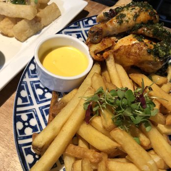 Parada - Yuca fries (left side) and order of half chicken (it comes with potato fries). - Peruvian Near Me - Walnut Creek, California