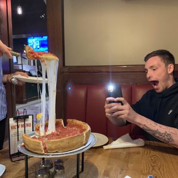 Giordano's - My excited Son with his first Chicago style pizza - Pizza Near Me - Chicago, Illinois Giordano's - My excited Son with his first Chicago style pizza - Pizza Near Me - Chicago, Illinois
