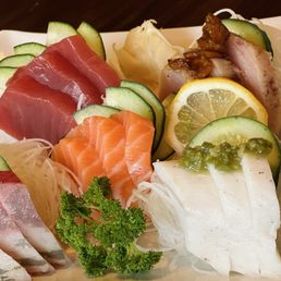 Chef's choice sashimi plate (comes with extra salad, soup and a side of rice) Chef's choice sashimi plate (comes with extra salad, soup and a side of rice)