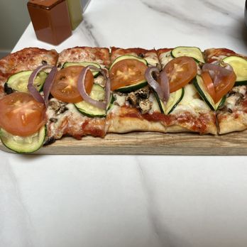 One Love Cafe - Roasted Veggie Flatbread - Coffee & Tea Near Me - San Bruno, California One Love Cafe - Roasted Veggie Flatbread - Coffee & Tea Near Me - San Bruno, California