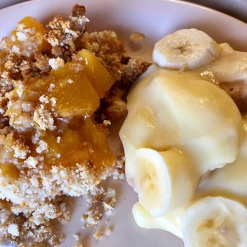 Camp Lone Star - Truly HOMEMADE peach cobbler. Oats in topping. On right is banana pudding w vanilla wafers. Not sugary :) - Community Centers Near Me - La Grange, Texas