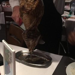 Boi na Brasa - Delicious meat ready to be cut in slice.