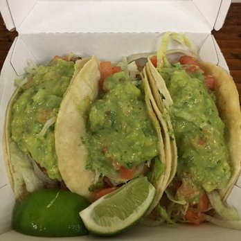 Cinco de Mayo - Soft shell tacos w/ pork al pastor, lettuce, tomato, lime, guacamole, spicy green salsa - Mexican Near Me - New York, New York Cinco de Mayo - Soft shell tacos w/ pork al pastor, lettuce, tomato, lime, guacamole, spicy green salsa - Mexican Near Me - New York, New York