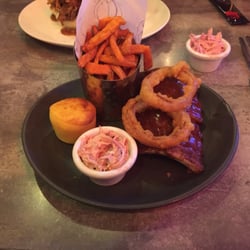 Sugar Rays Smokehouse - Half baby back ribs, sweet potato fries, onion rings and slaw