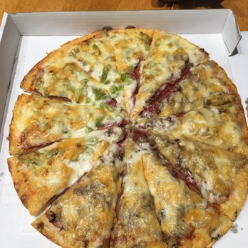 Varsity Pizza & Subs - a pizza in a box - Pizza Near Me - Calgary, Alberta Varsity Pizza & Subs - a pizza in a box - Pizza Near Me - Calgary, Alberta