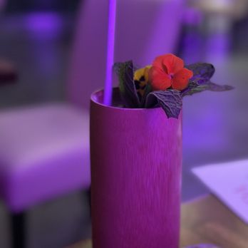 Agenda Restaurant - a pink vase with a flower in it - Cocktail Bars Near Me - Astoria, New York Agenda Restaurant - a pink vase with a flower in it - Cocktail Bars Near Me - Astoria, New York