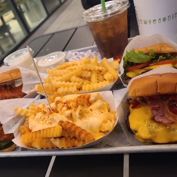 Shake Shack Encino Courtyard - Shack Burger, chicken burger, buffalo chicken burger, smoke shake burger, buffalo cheese fries and regular fries. - Burgers Near Me - Encino, California Shake Shack Encino Courtyard - Shack Burger, chicken burger, buffalo chicken burger, smoke shake burger, buffalo cheese fries and regular fries. - Burgers Near Me - Encino, California