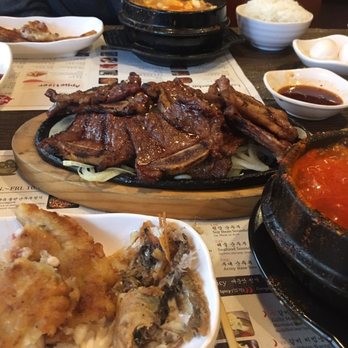 DuBu - La Galbi (beef) at the center medium spiced seafood bottom right and mild beef soup on the top - Korean Near Me - Elkins Park, Pennsylvania