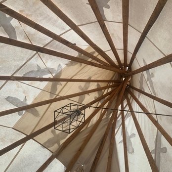 Buffalo Ridge Camp Resort - Looking up at top of tee pee from inside - Campgrounds Near Me - Custer, South Dakota