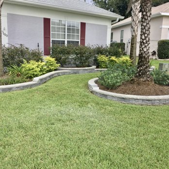 Monarch Landscaping - Here's a retaining wall we built for a customer last month in The Villages, Fl - Landscaping Near Me