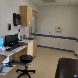 Priority Care Pediatrics, LLC - Liberty - Exam room and baby legs :)