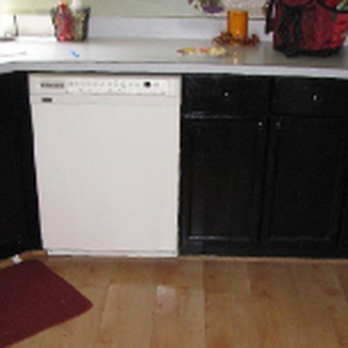 Epic Kitchen And Bath - a white dishwasher in a black and white kitchen - General Contractors Near Me - Ijamsville, Maryland