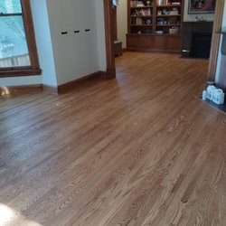 FLOORecki Floors And Stairs - Oak Park project: replaced a squeaky floor with new red oak hardwood, then sanded, stained, and finished for lasting beauty.