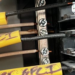 Farnum Inspection Service - See that bump on the white wire, that's melting sheathing.