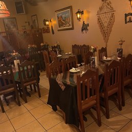 tables and chairs in a restaurant tables and chairs in a restaurant
