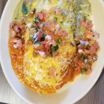 Snooze, an A.M. Eatery - Breakfast burrito with half ranchero sauce and half verde - Breakfast & Brunch Near Me - Nashville, Tennessee