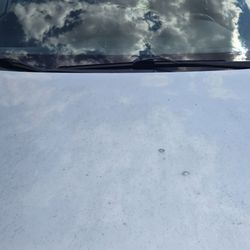 The hood of my car after $18 car wash.