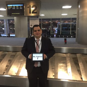 Elite Town Car Services Houston - My driver waiting for us with an IPad! Exciting!!! - Town Car Service Near Me - Houston, Texas Elite Town Car Services Houston - My driver waiting for us with an IPad! Exciting!!! - Town Car Service Near Me - Houston, Texas