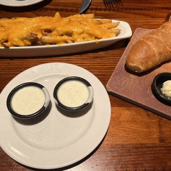 LongHorn Steakhouse - Cheese fries no bacon lots a ranch and bread - Steakhouses Near Me - Florence, Kentucky
